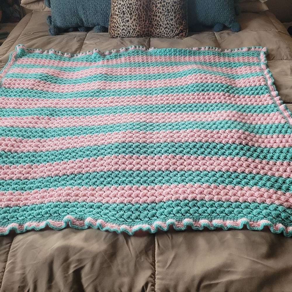 Crocheted baby blanket aqua and pink